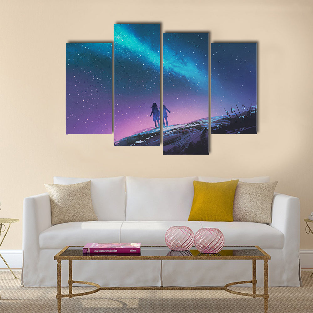Young couple standing holding hands against the Milky Way galaxy Multi Panel Canvas Wall Art
