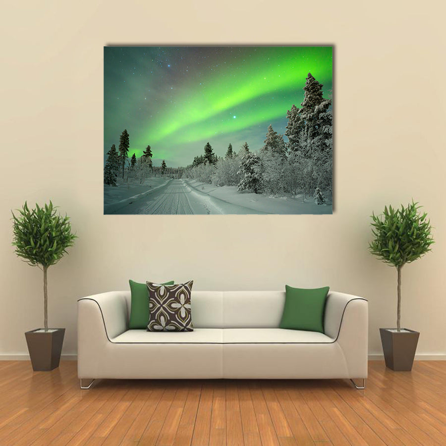northern lights on a track through winter landscape Multi panel canvas wall art