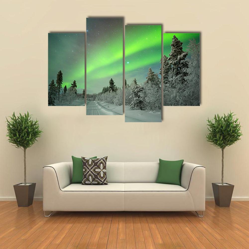 northern lights on a track through winter landscape Multi panel canvas wall art