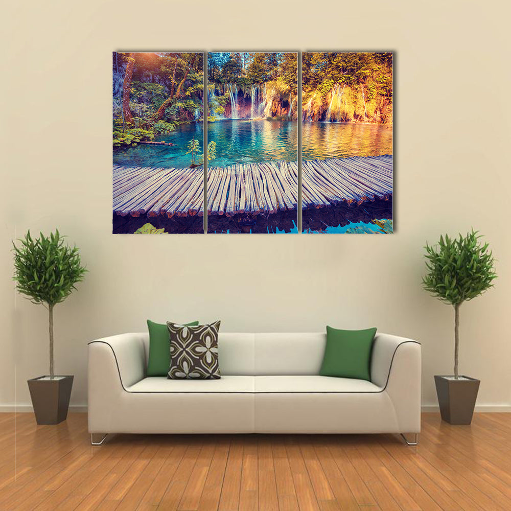 Majestic view on turquoise water and sunny beams in the Plitvice Lakes National Park, Croatia multi panel canvas wall art