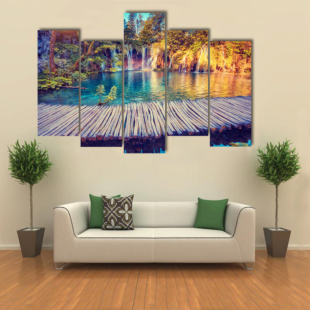 Majestic view on turquoise water and sunny beams in the Plitvice Lakes National Park, Croatia multi panel canvas wall art