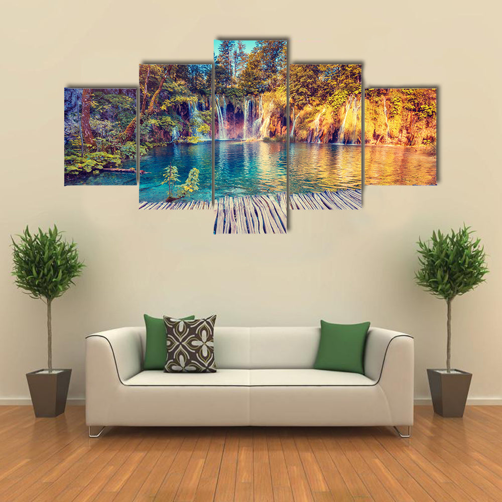 Majestic view on turquoise water and sunny beams in the Plitvice Lakes National Park, Croatia multi panel canvas wall art