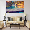 Majestic view on turquoise water and sunny beams Multi panel canvas wall art