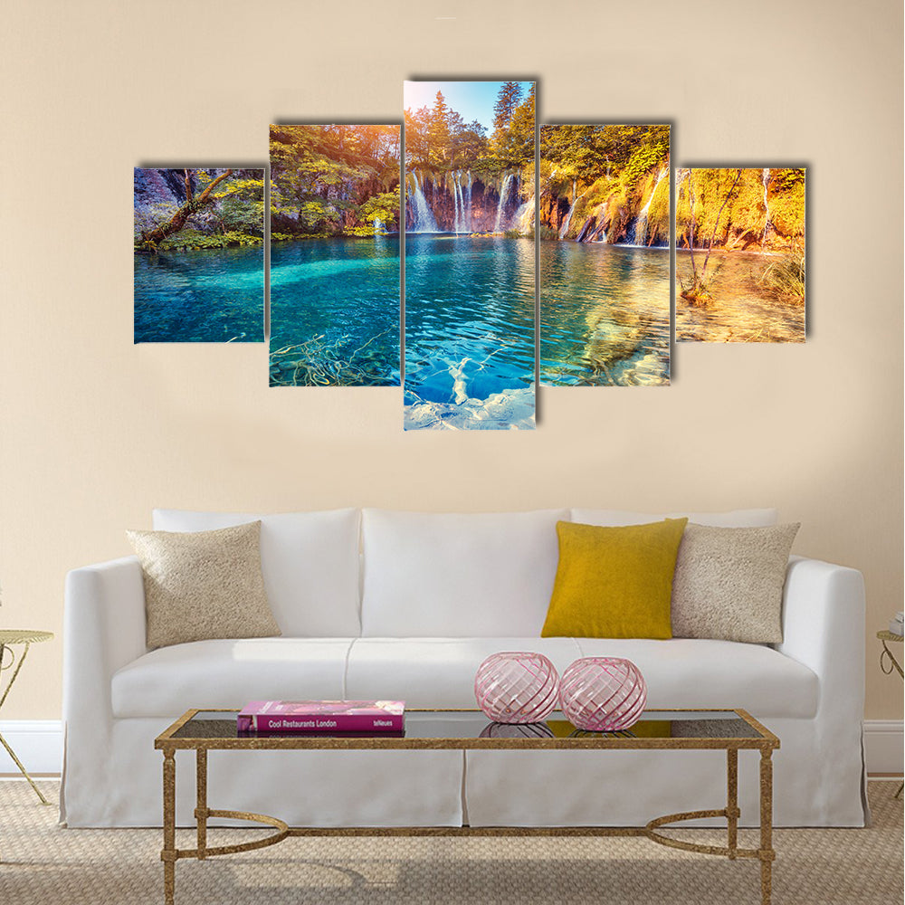 Majestic view on turquoise water and sunny beams Multi Panel Canvas Wall Art