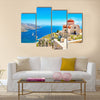 Amazing view on remote church with red roofing on the Cliff of the sea, Greece Multi Panel Canvas Wall Art