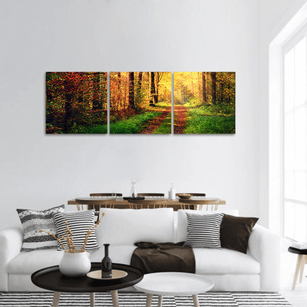 Autumn forest scenery with rays of sun light panoramic canvas wall art