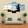 In The Evening With Cool Breeze A Silhouette Muslim Praying Before God Multi Panel Canvas Wall Art