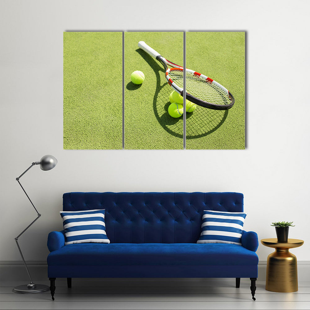 Tennis racket and balls on the court grass Multi panel canvas wall art