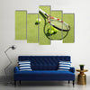 Tennis racket and balls on the court grass Multi panel canvas wall art