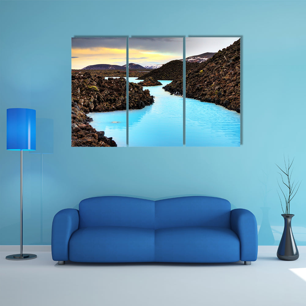 A Blue lagoon waters in the lava field landscape of Iceland in winter, HDR multi panel canvas wall art