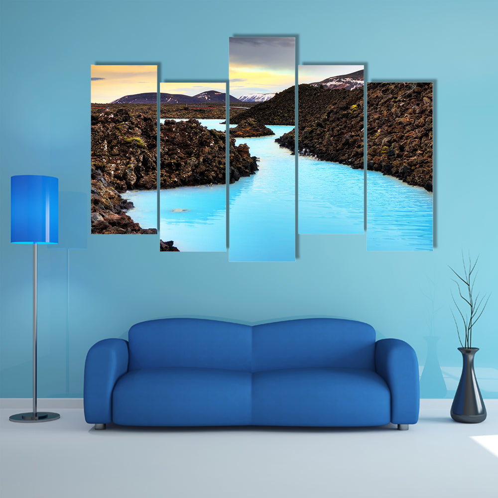 A Blue lagoon waters in the lava field landscape of Iceland in winter, HDR multi panel canvas wall art