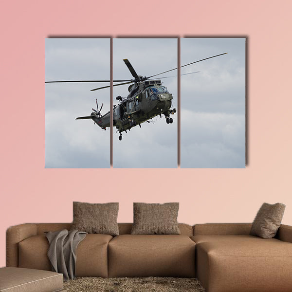 Royal Navy Sea King helicopter flying at Yeovilton Air Day multi panel canvas wall