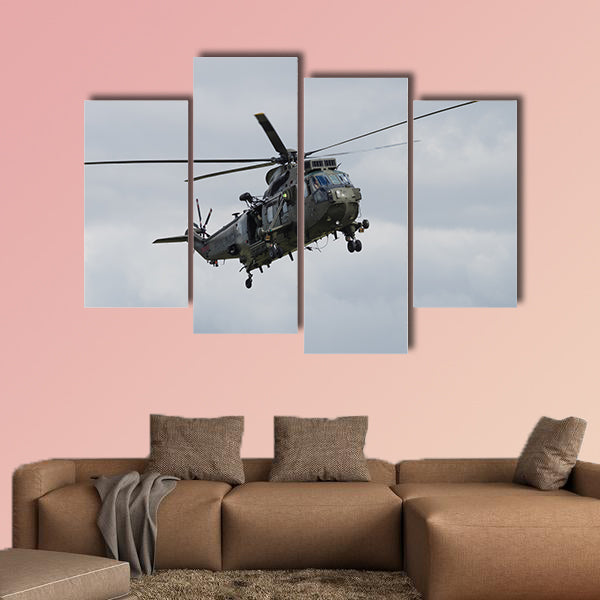 Royal Navy Sea King helicopter flying at Yeovilton Air Day multi panel canvas wall