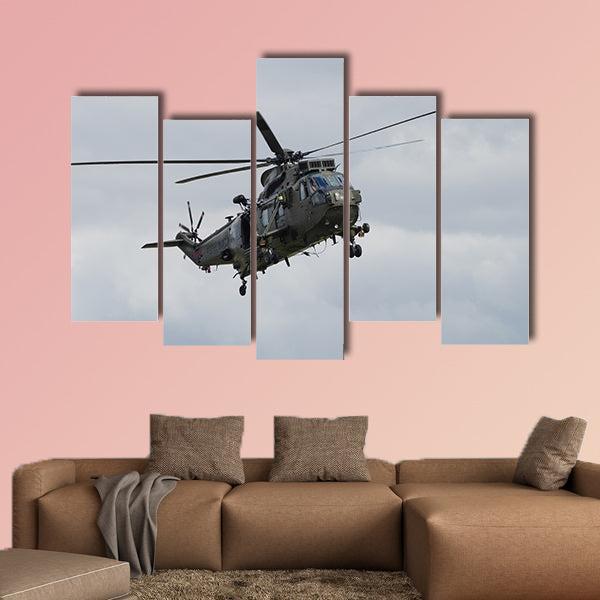 Royal Navy Sea King helicopter flying at Yeovilton Air Day multi panel canvas wall