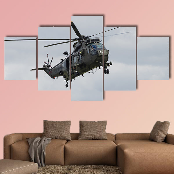 Royal Navy Sea King helicopter flying at Yeovilton Air Day multi panel canvas wall