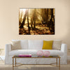 Beautiful young deer at sunset in the forest multi panel canvas wall art