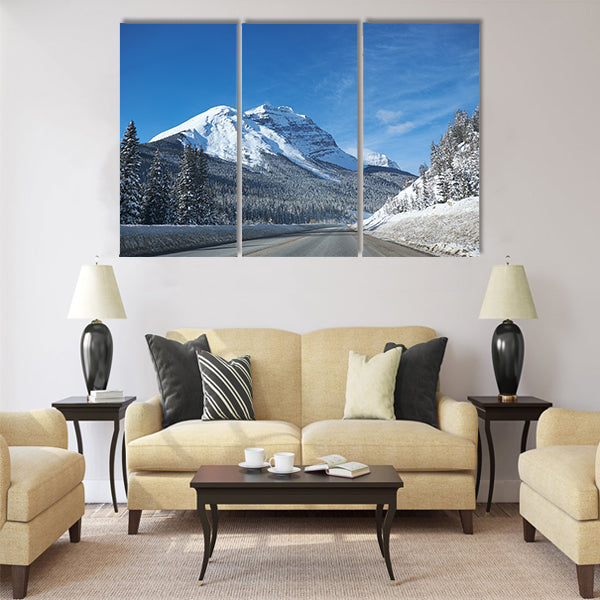 Empty open road at Banff Canada in winter multi panel canvas wall art