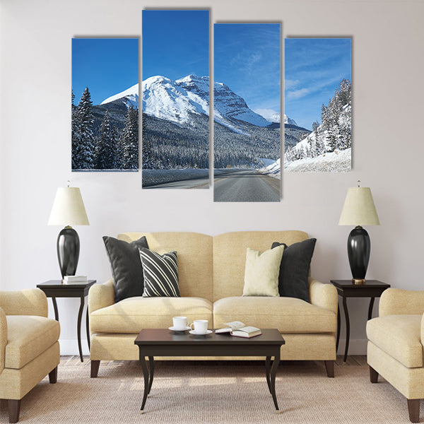 Empty open road at Banff Canada in winter multi panel canvas wall art