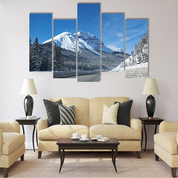 Empty open road at Banff Canada in winter multi panel canvas wall art