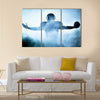 One American football player portrait in silhouette shadow on white background Multi Panel Canvas Art