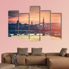 Evening view on Budapest from river to the bridge multi panel canvas wall art