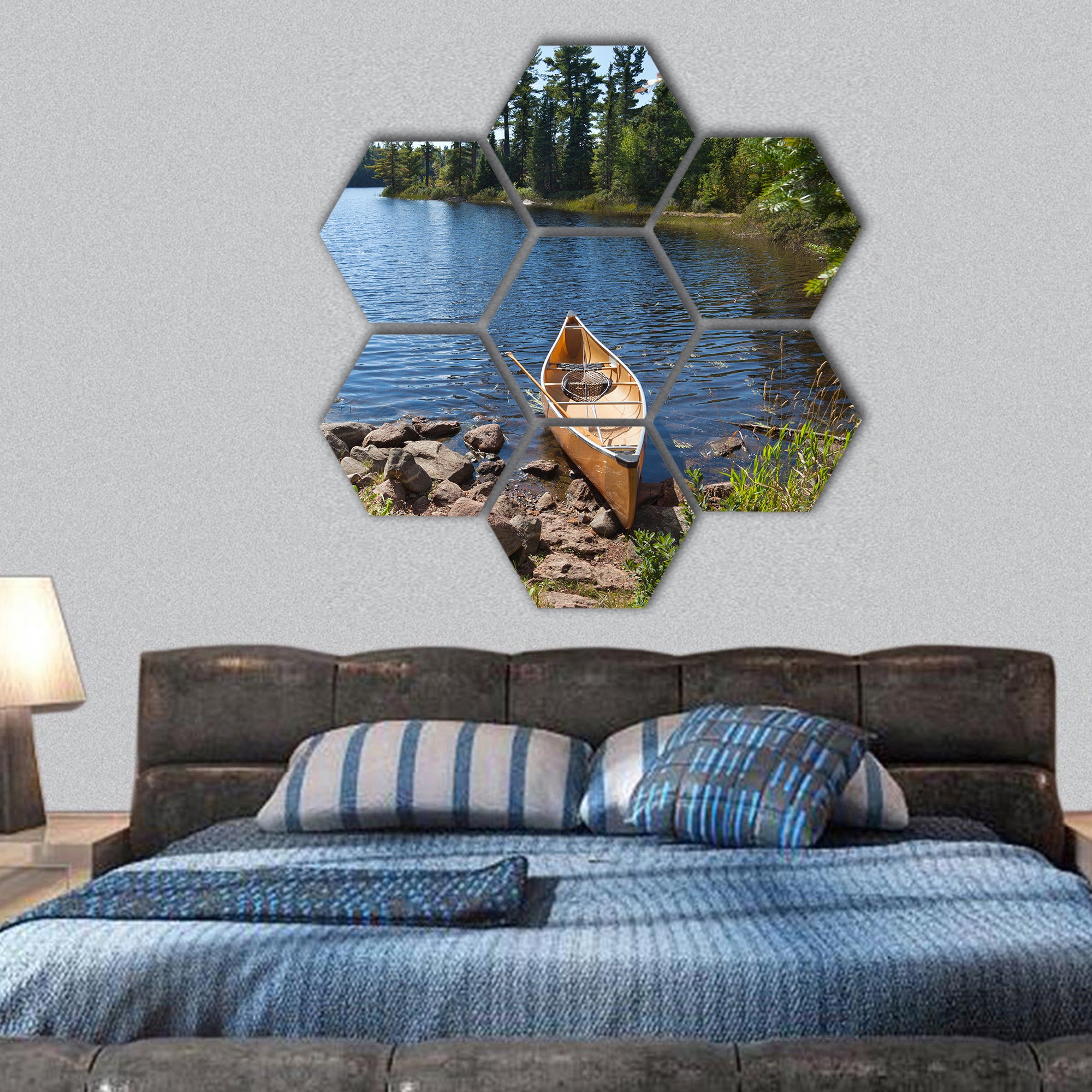 Fisherman's canoe on a rocky shore of Minnesota lake hexagonal canvas wall art