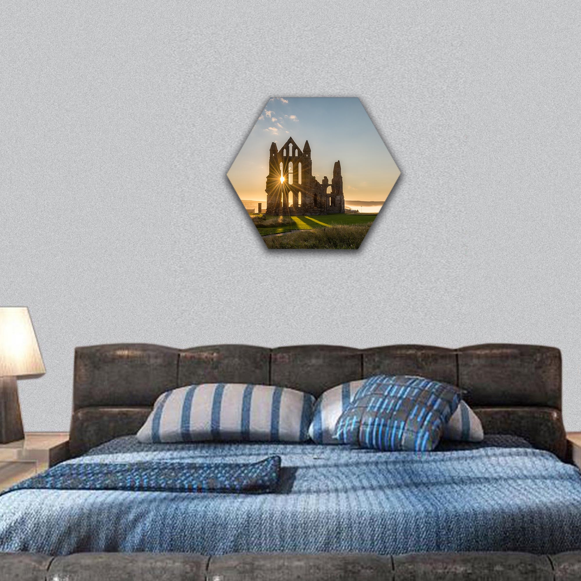 The Gothic ruins of Whitby Abbey with the suns rays hexagonal canvas wall art