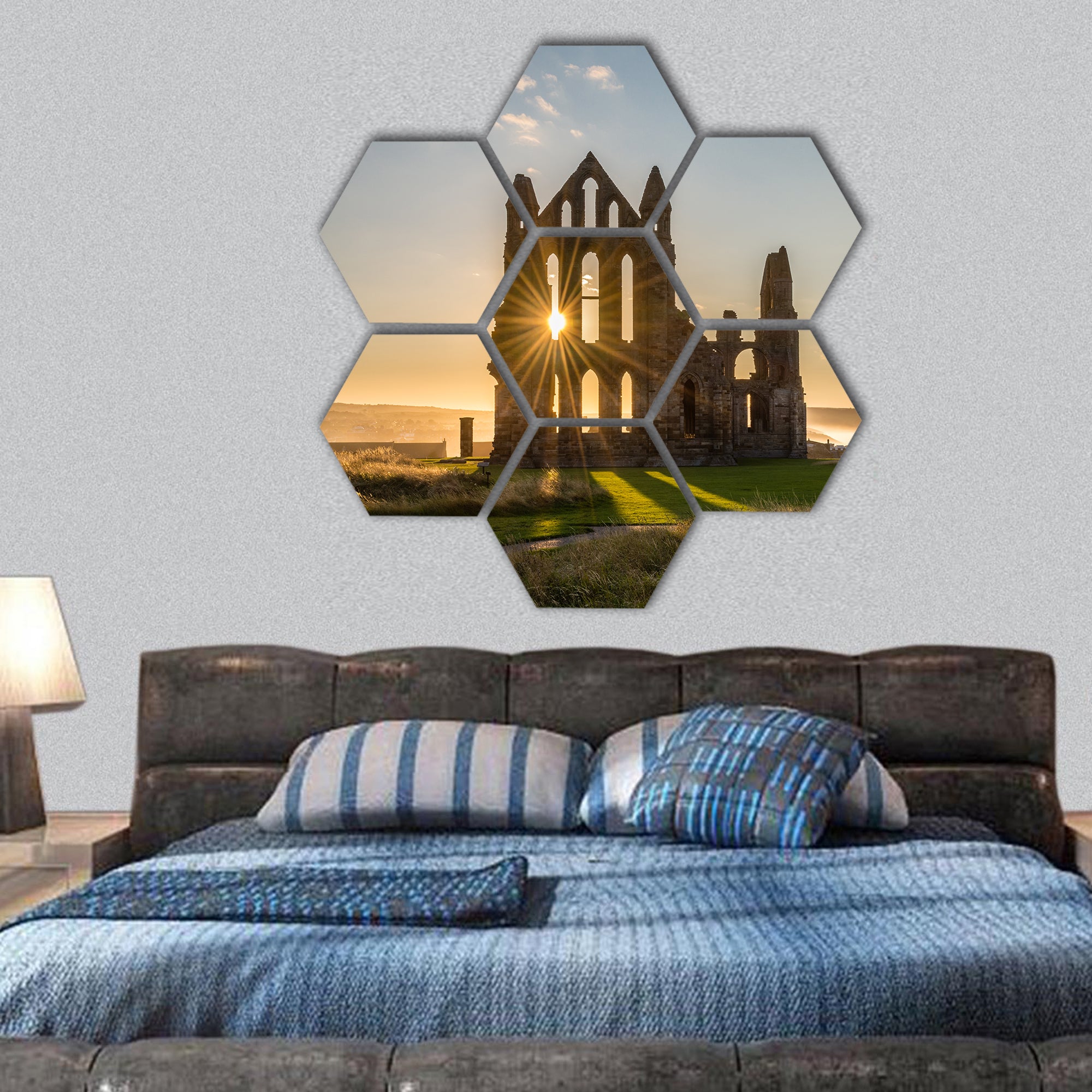The Gothic ruins of Whitby Abbey with the suns rays hexagonal canvas wall art