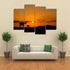 Elephants in African savannah at sunset multi panel canvas wall art