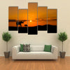 Elephants in African savannah at sunset multi panel canvas wall art