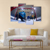 Ice hockey goalkeeper player on goal Multi panel canvas wall art