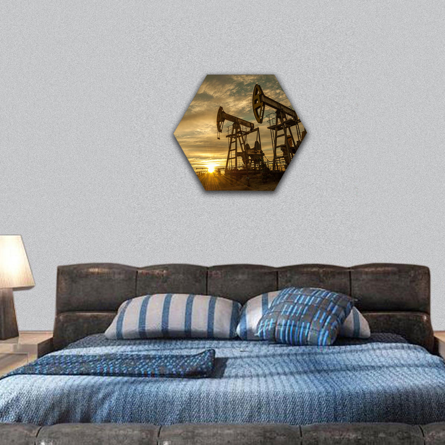 Oil pump jacks at sunset sky background hexagonal canvas wall art