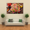 Italian pizza pepperoni tomatoes olives basil and red wine on wooden table Multi panel canvas wall art