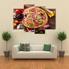 Italian pizza pepperoni tomatoes olives basil and red wine on wooden table Multi panel canvas wall art