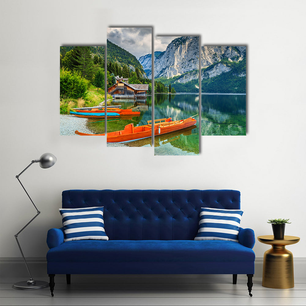 Wooden boat dock with traditional boats and high rocky mountains multi panel canvas wall art