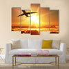 Plane takes off at sunrise multi panel canvas wall art