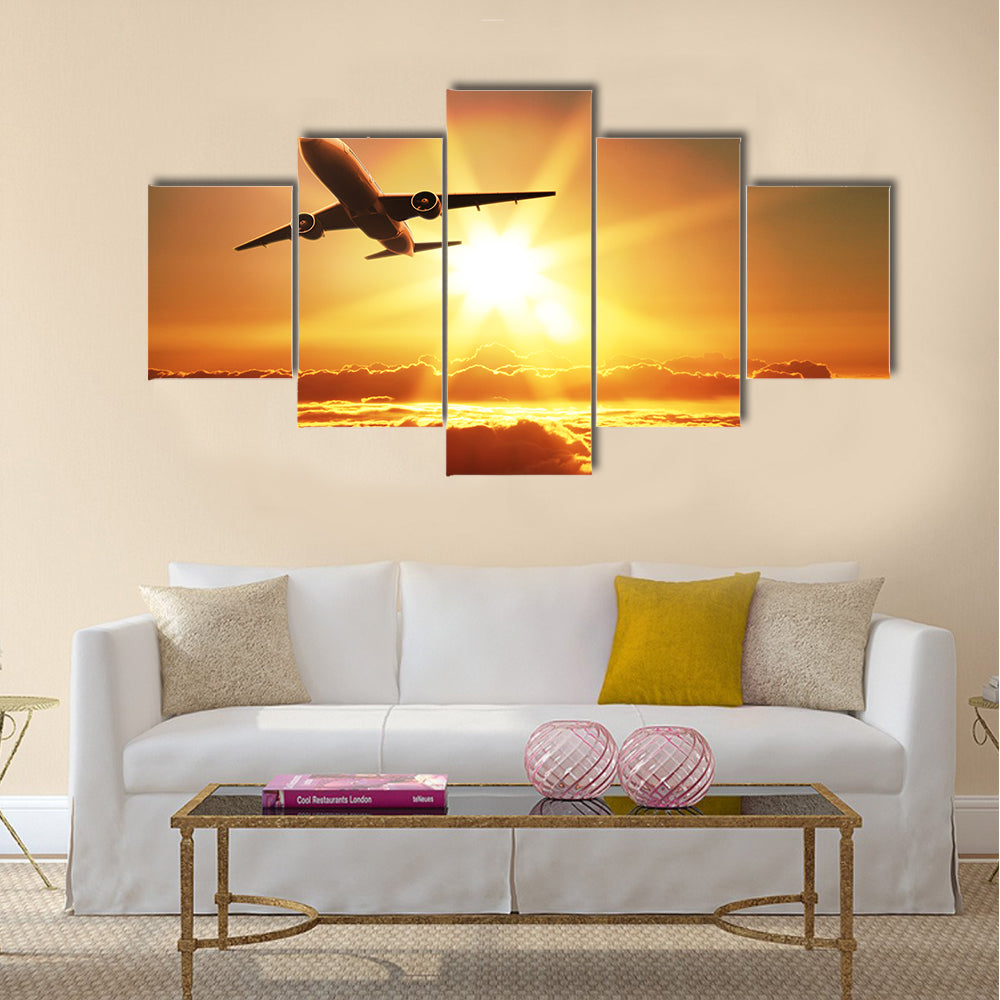 Plane takes off at sunrise multi panel canvas wall art