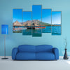 A floating restaurant at Batur Lake with blue sky Bali Indonesia multi panel canvas wall art