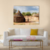 Himba village with traditional huts near Etosha National Park in Namibia, Africa Multi panel canvas wall art