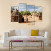 Himba village with traditional huts near Etosha National Park in Namibia, Africa Multi panel canvas wall art