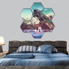 Spaceship crashed on blue field hexagonal canvas wall art