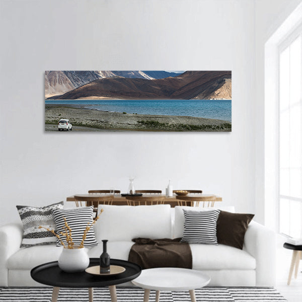 White car at Pangong lake panoramic canvas wall art