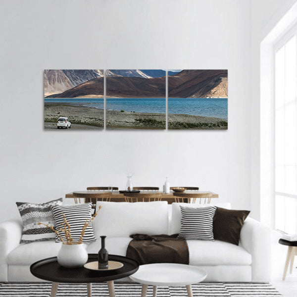 White car at Pangong lake panoramic canvas wall art