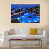 Resort by the Caribbean sea at night Multi panel canvas wall art