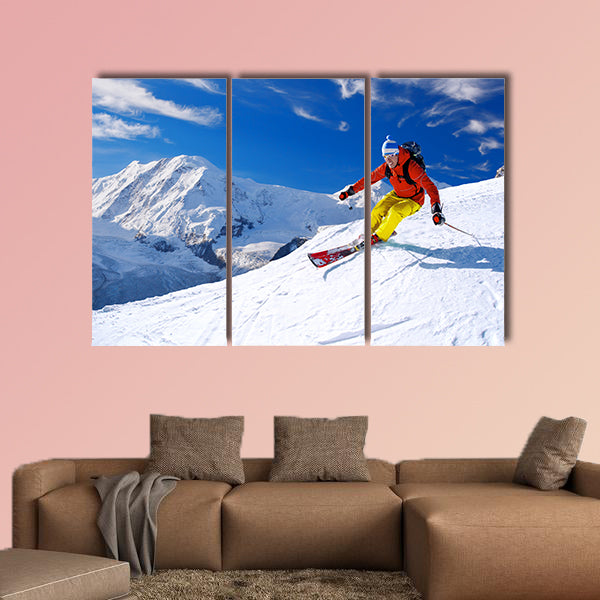 Skier skiing downhill in high mountains, Matterhorn area, Switzerland Multi panel canvas wall art