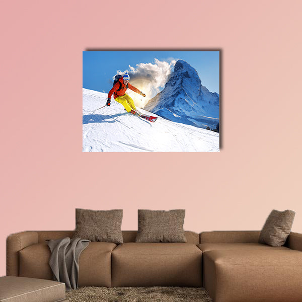 Skier skiing downhill against Matterhorn peak in Switzerland Multi panel canvas wall art