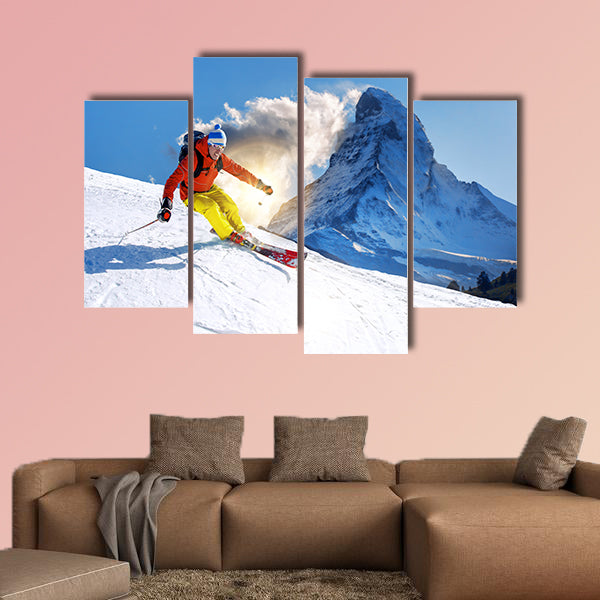 Skier skiing downhill against Matterhorn peak in Switzerland Multi panel canvas wall art