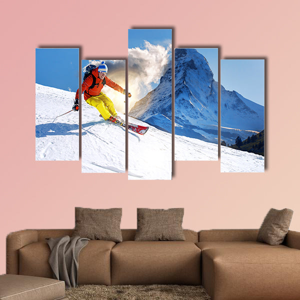 Skier skiing downhill against Matterhorn peak in Switzerland Multi panel canvas wall art