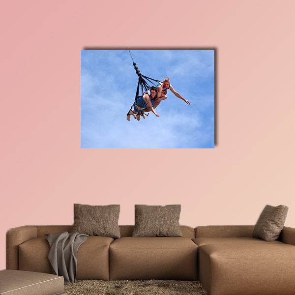 Mature couple rids on SkyCoaster in Wet'n'Wild Gold Coast water park Multi panel canvas wall art