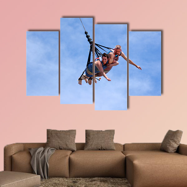 Mature couple rids on SkyCoaster in Wet'n'Wild Gold Coast water park Multi panel canvas wall art